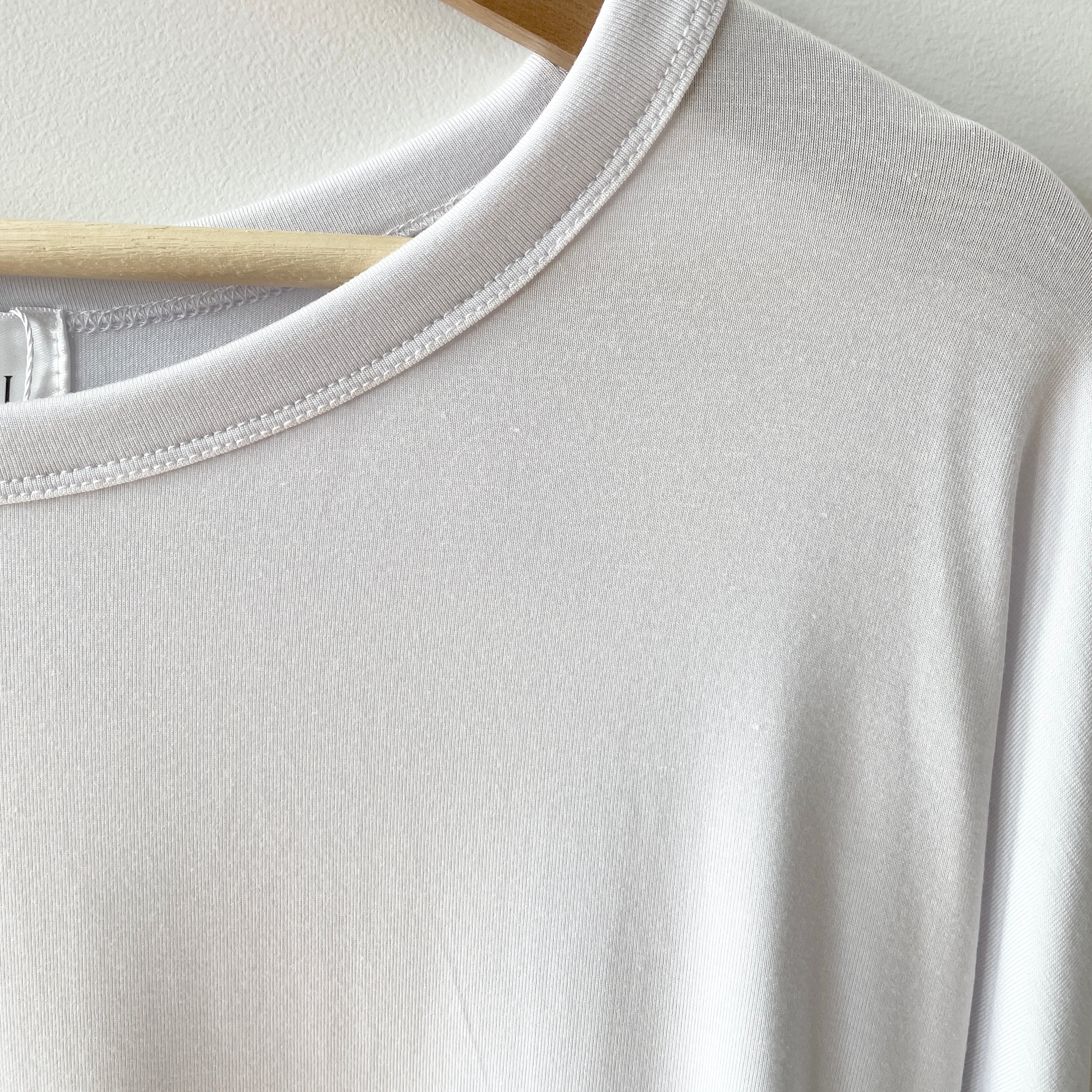 Close up of collar of the white Bamboo 3/4 sleeve t-shirt made in canada