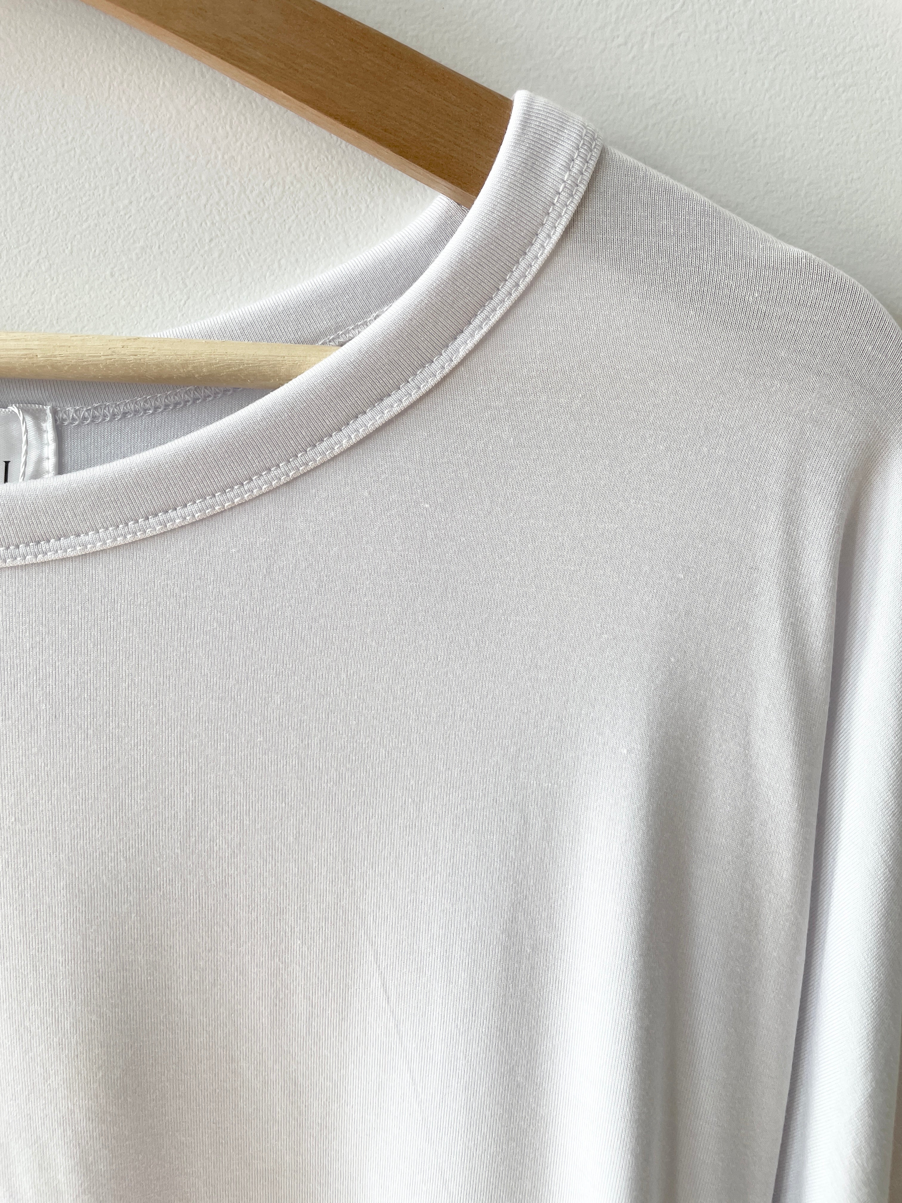 Close up of collar of the white Bamboo 3/4 sleeve t-shirt made in canada