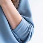 close up of sleeve Sky Blue sweater dress with long sleeves for women