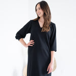 front view of black sweater knit dress for women