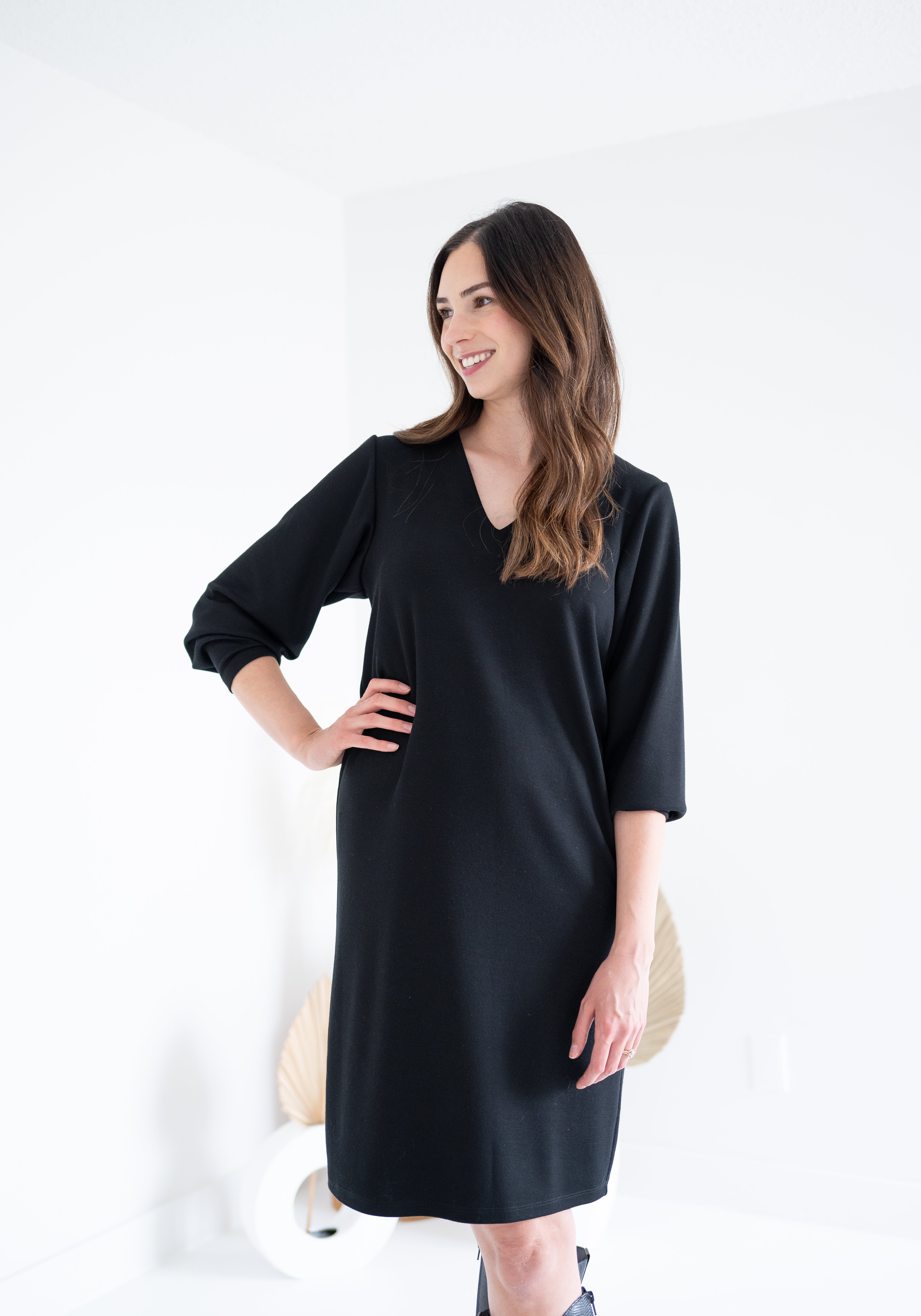 front view of black sweater knit dress for women