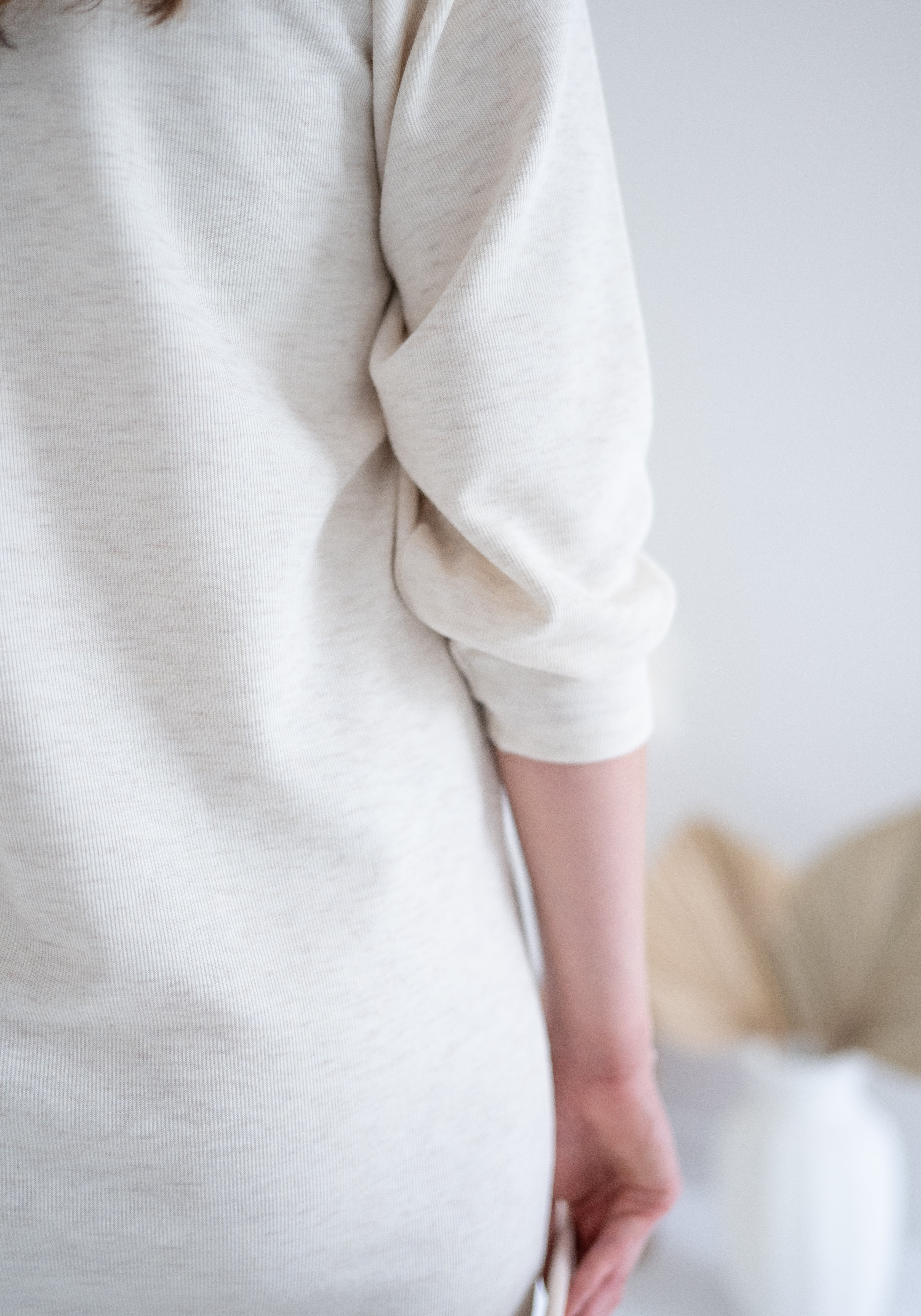 close up of ally dress cream sweater dress