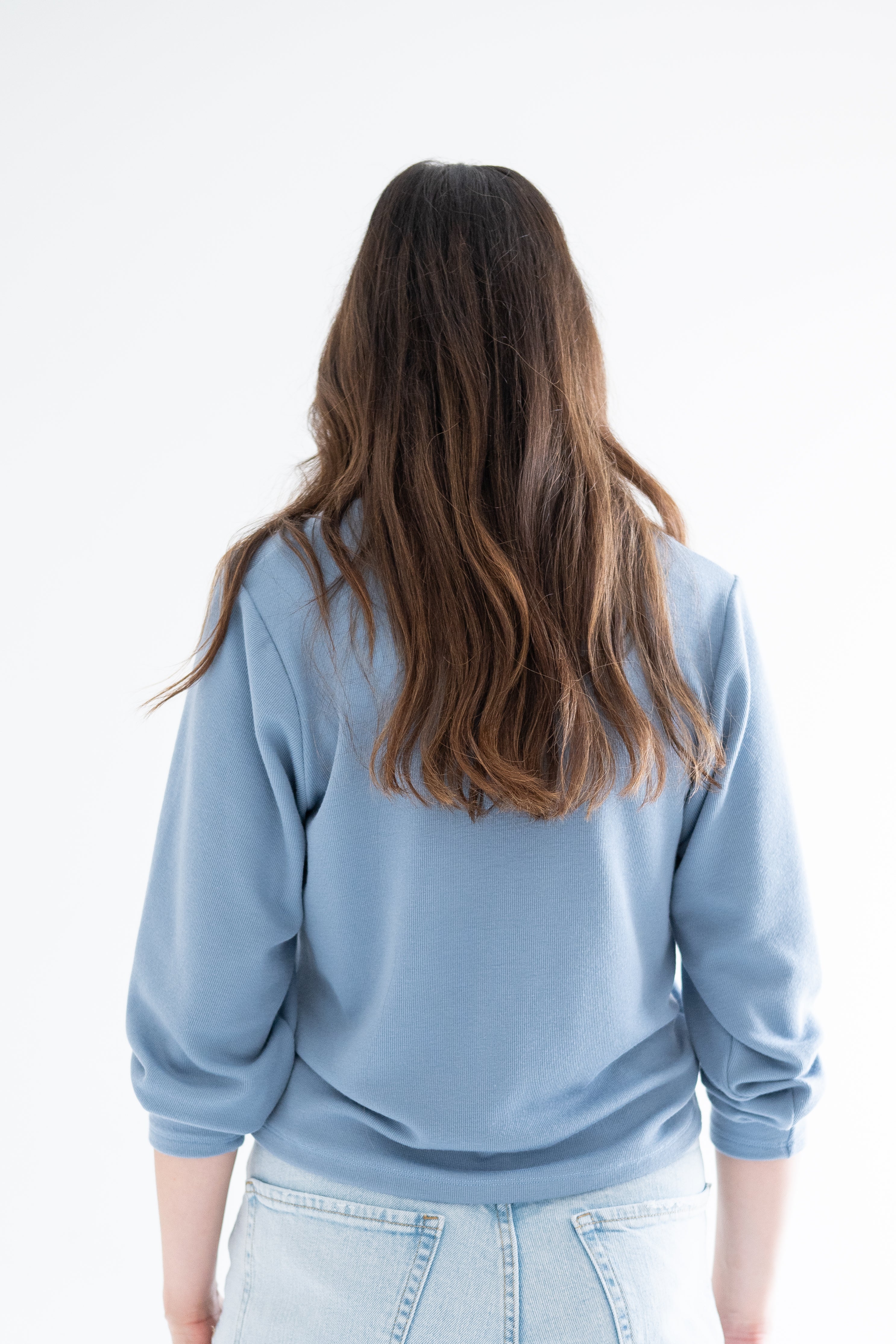 back view of ang hill ally sweater