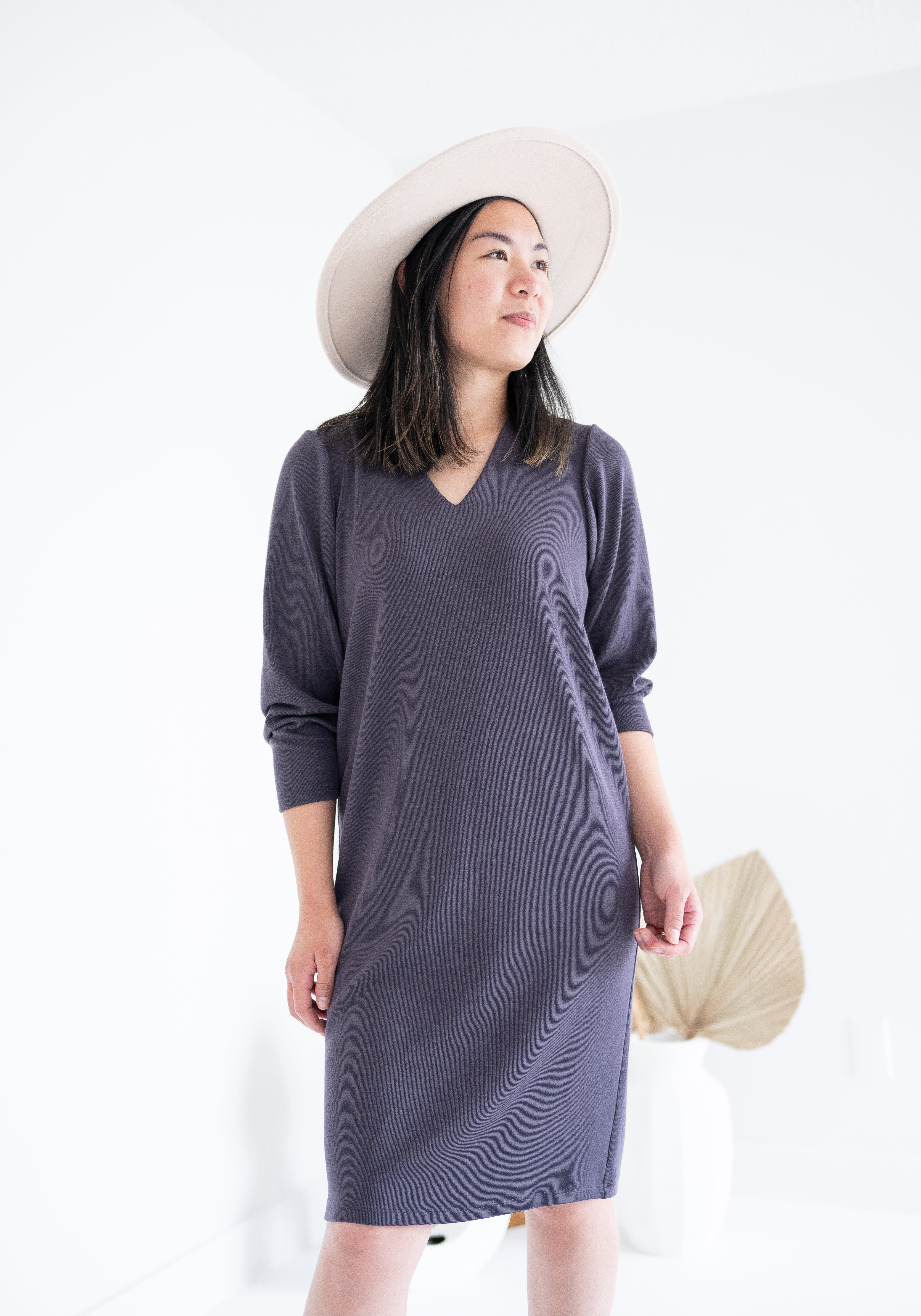 front view of vneck grey sweater dress with long sleeves for women