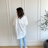 back view of white button up shirt