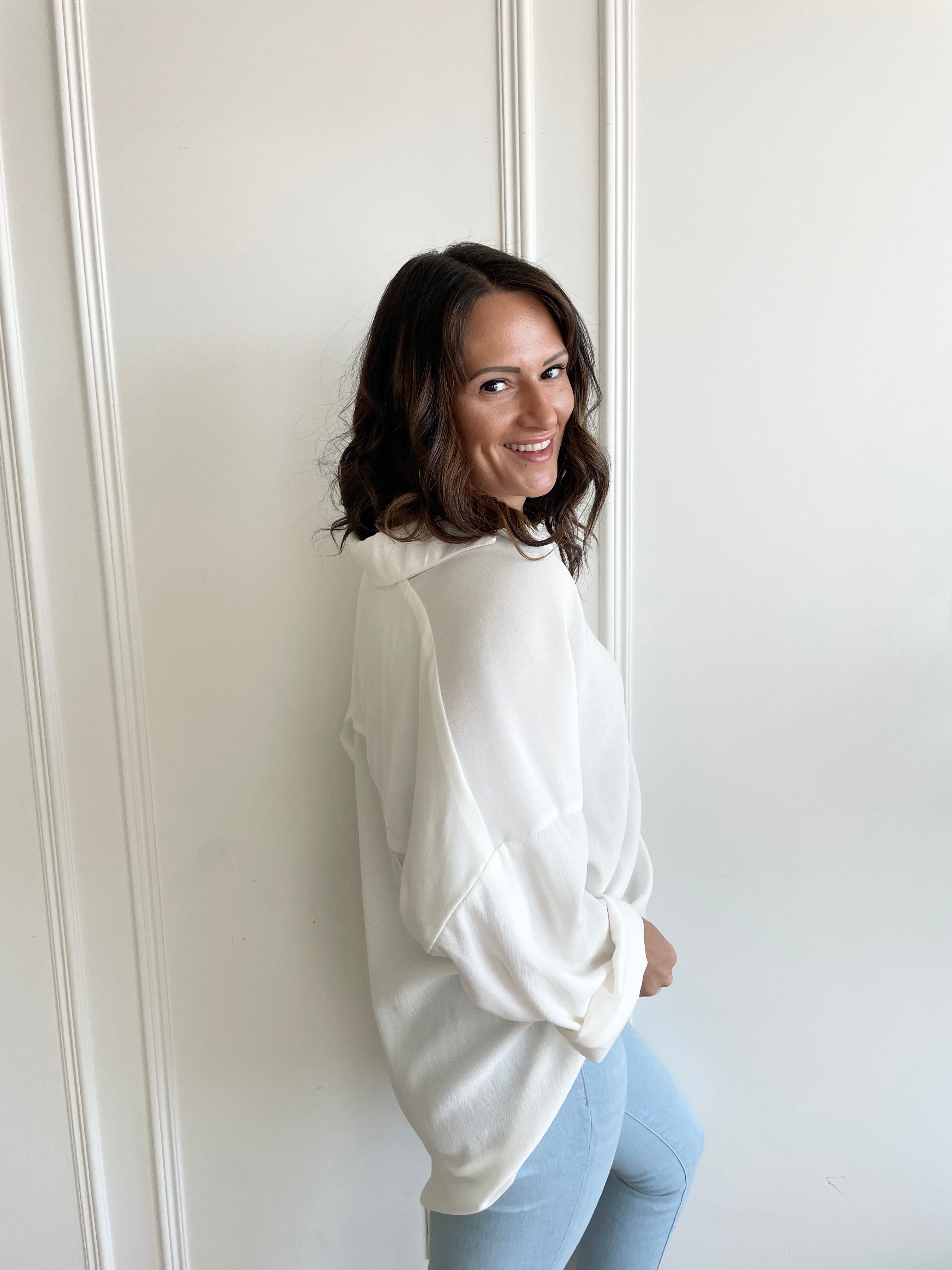 side view of white button up shirt