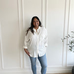 white oversized button down shirt with jeans