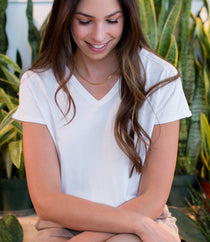 woman wearing a white bamboo v-neck t-shirt for women